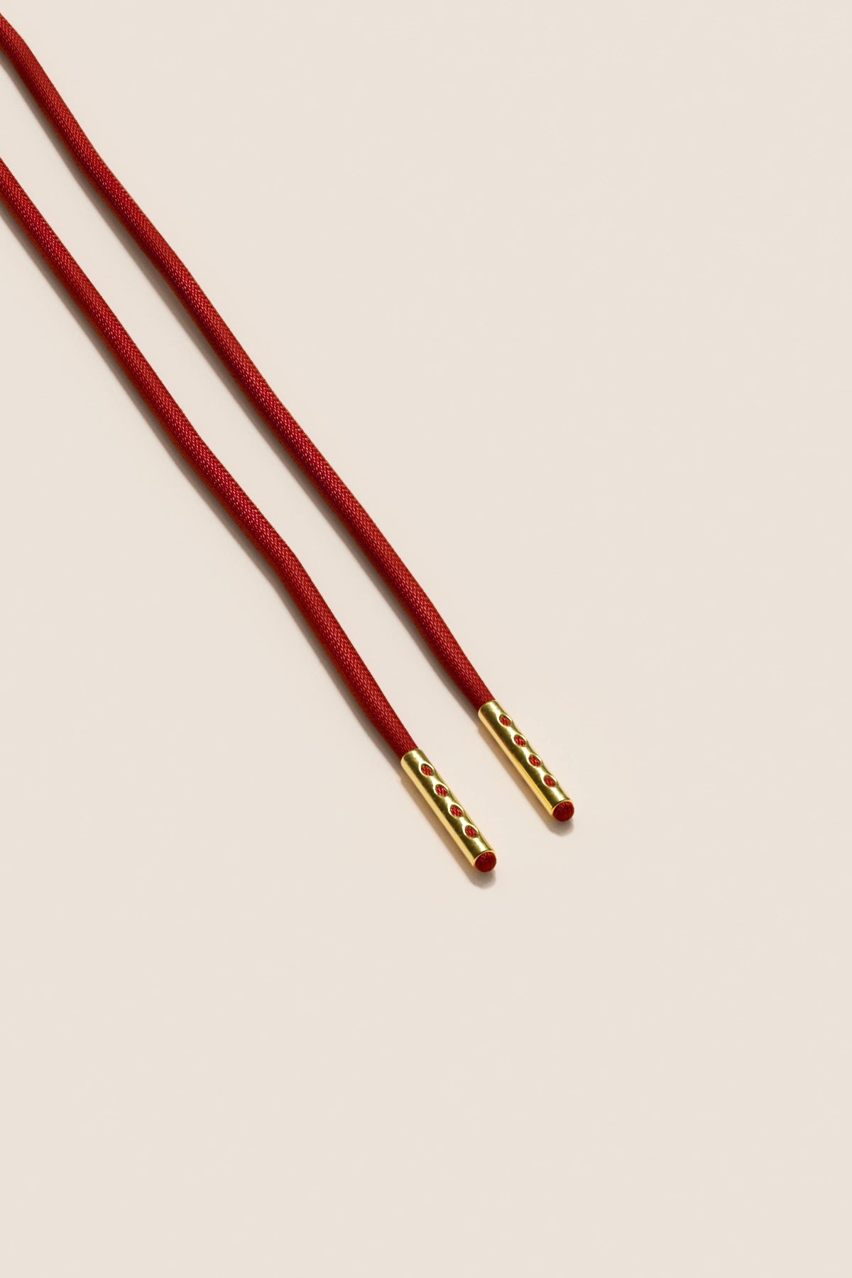 Senkels Cherry 2.5mm Round Waxed Shoelaces with Gold Aglets