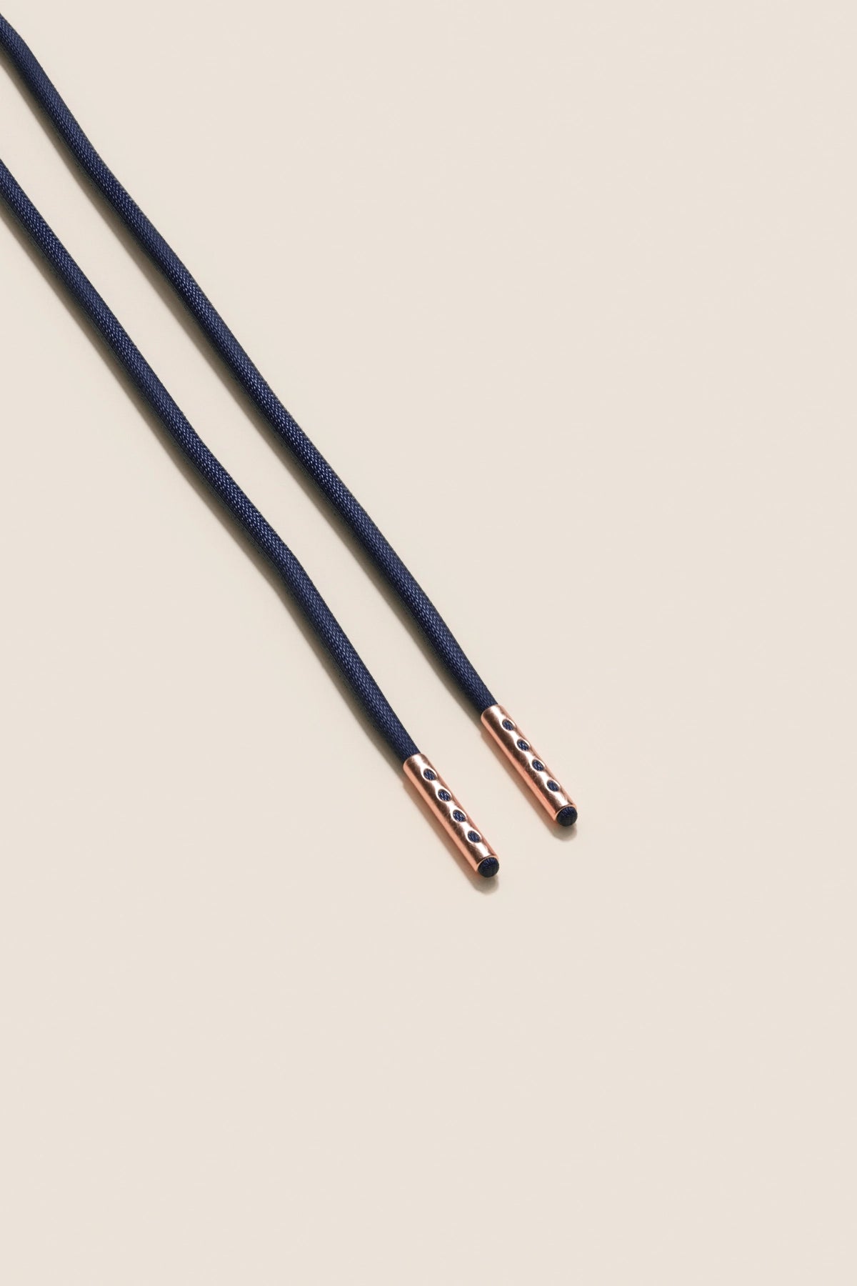 Senkels Dark Blue 2.5mm Round Waxed Shoelaces with Rose Gold Aglets