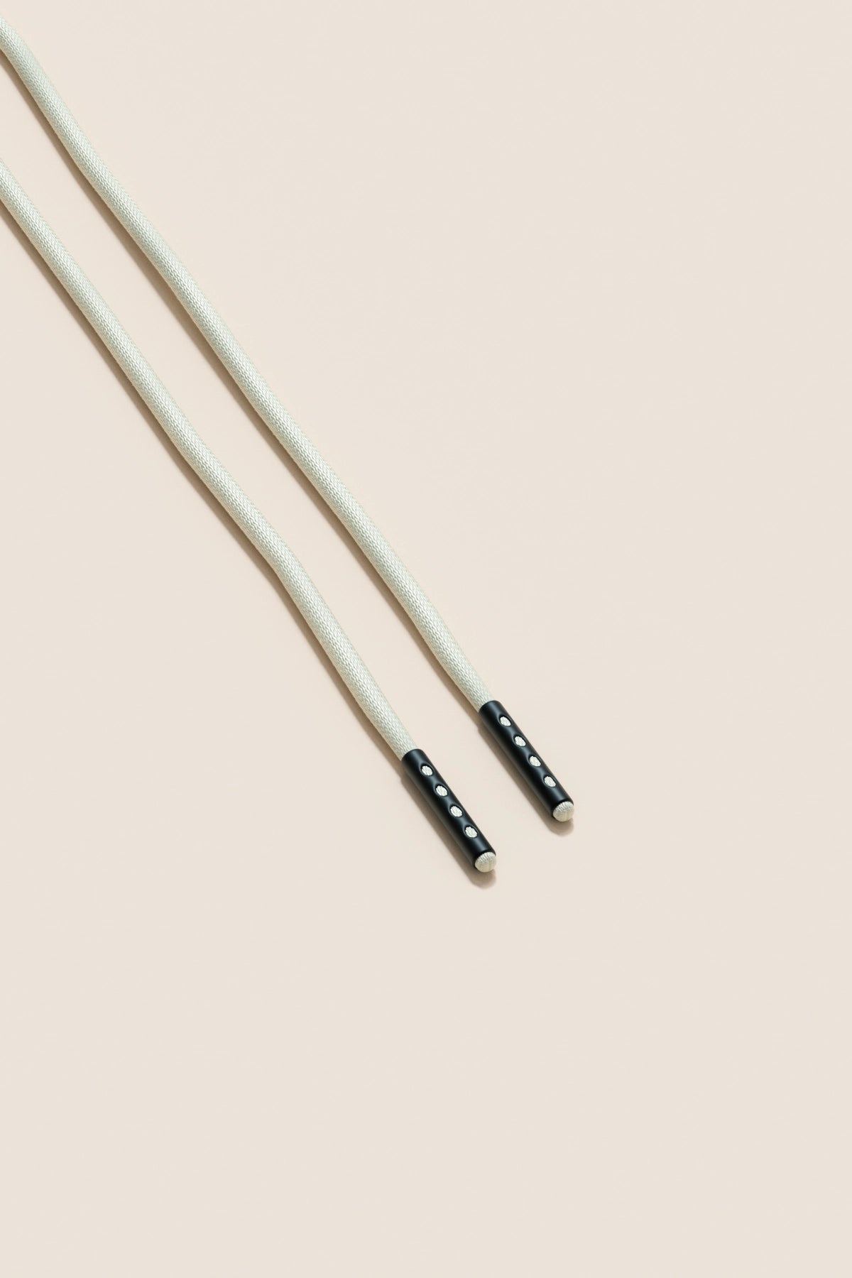 Senkels Off White 2.5mm Round Waxed Shoelaces with Black Matte Aglets