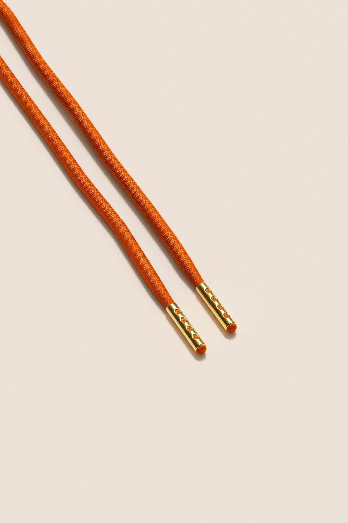 Senkels Orange 4mm Round Waxed Shoelaces with Gold Aglets